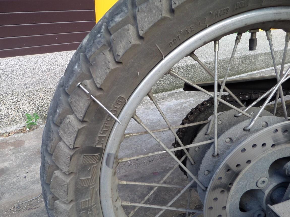 Chumphon-Thiland-nail-in-tire.jpg