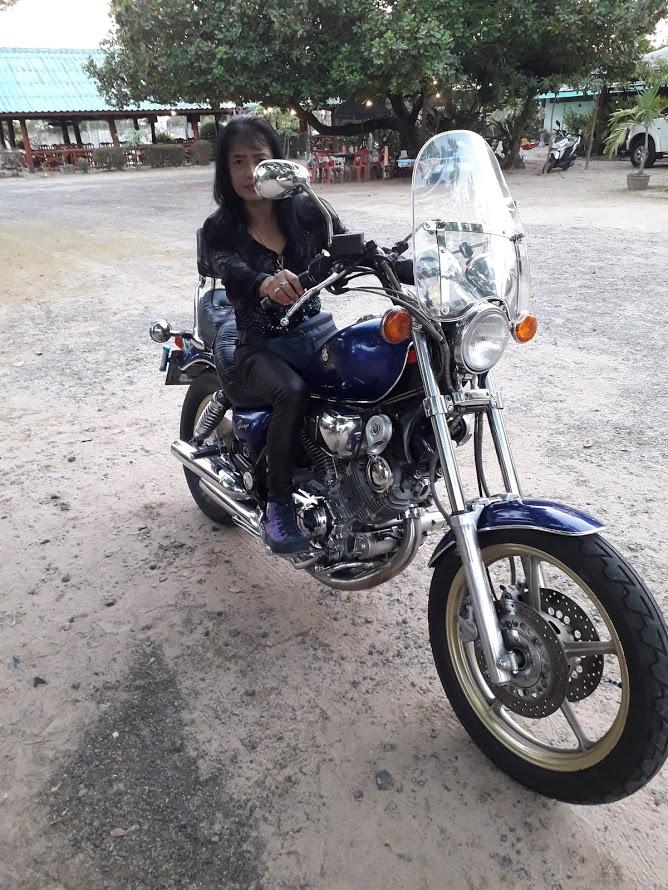 Gey on bike at gung place from front nice.jpg