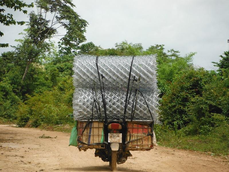 Laos%20Bamboo%20bridge%20Motorcycle%20%2021.jpg